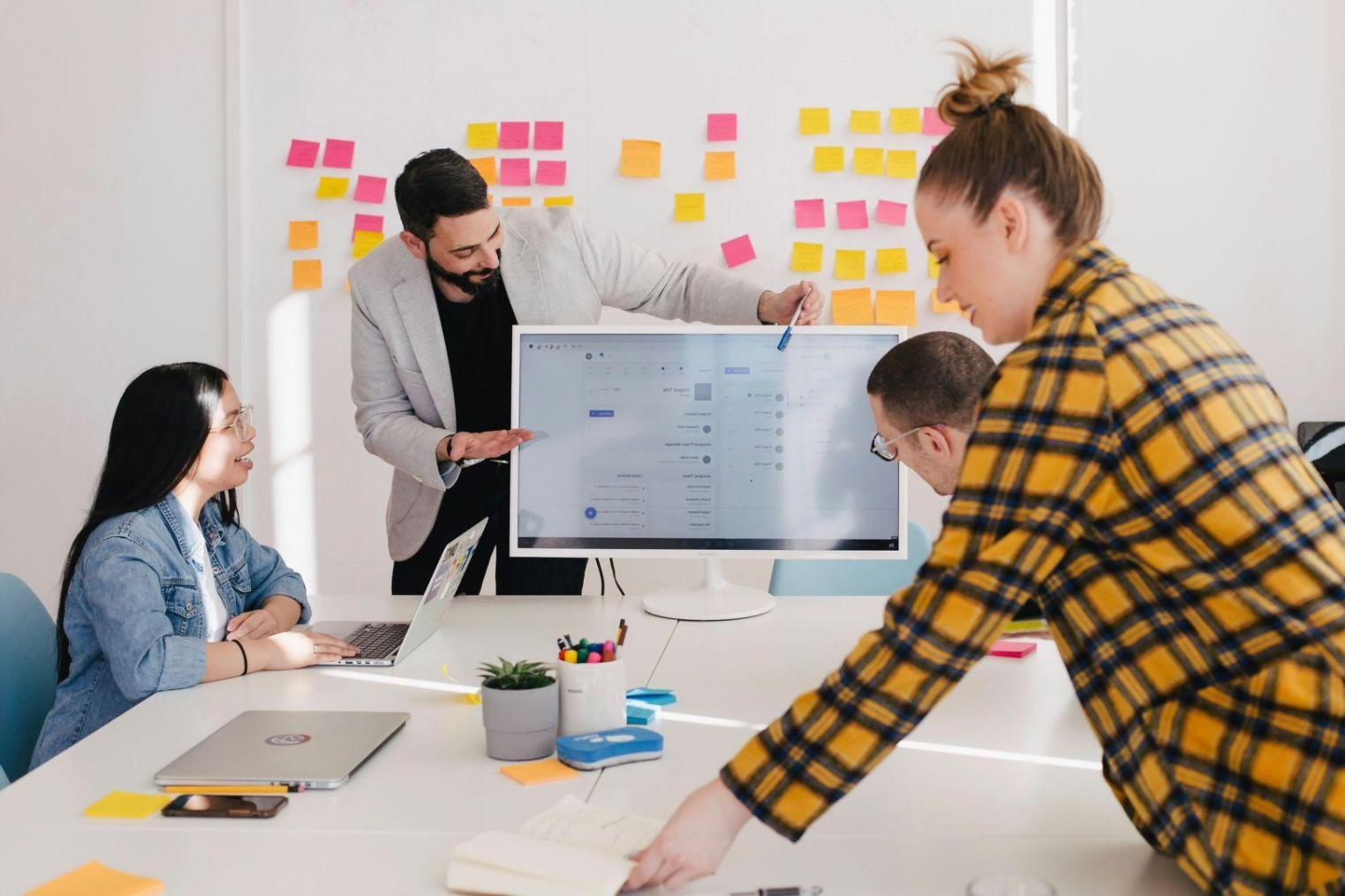 Business professional analyzing complex financial reports and forecasting models